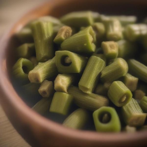 A bowl of cooked okra for dogs