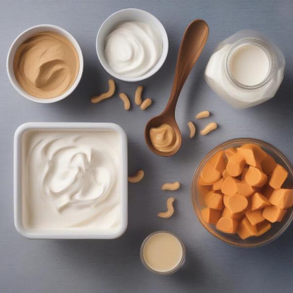 Dog-safe icing ingredients like yogurt, peanut butter, and banana.