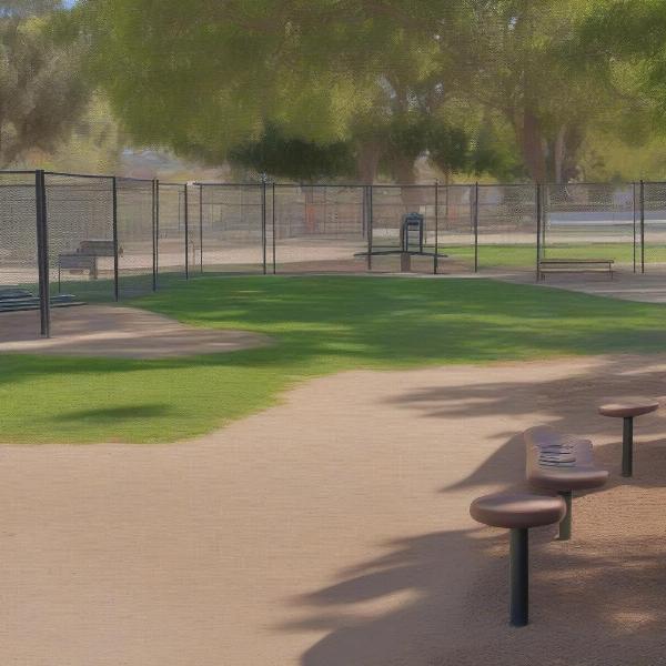 La Mesa Dog Park Amenities: Separate areas for large and small dogs, shady trees, water fountains, and benches for owners.