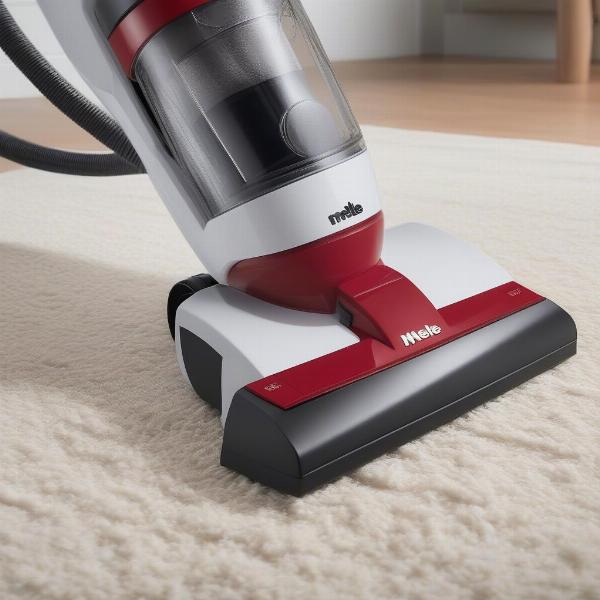 Miele Blizzard CX1 Cat and Dog vacuuming pet hair from a carpet