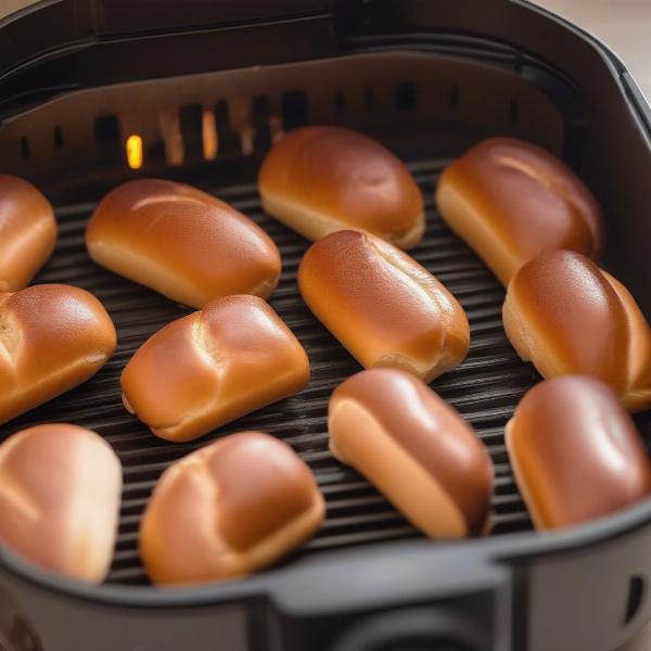 Air fryer toasting hot dog buns