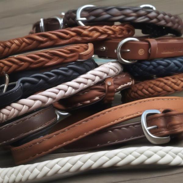 Different sizes of plaited leather dog collars to illustrate the variety available for various dog breeds