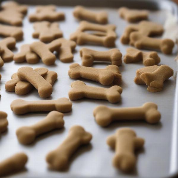 Homemade vegetarian dog treats on a baking sheet