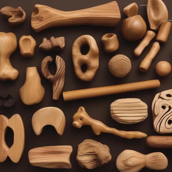 Different shapes and sizes of olive wood chews for dogs