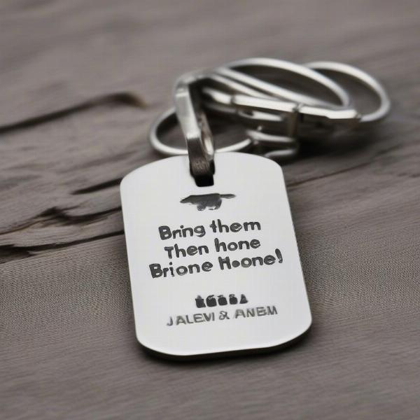 Closeup of a "Bring Them Home" Dog Tag