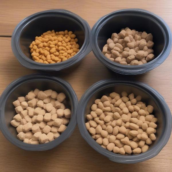 Various types of puppy food - kibble, wet, freeze-dried