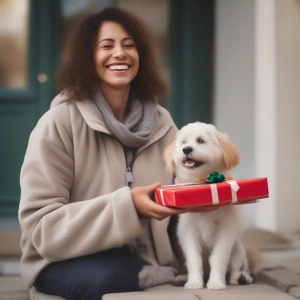 Dog walker smiling while receiving a gift