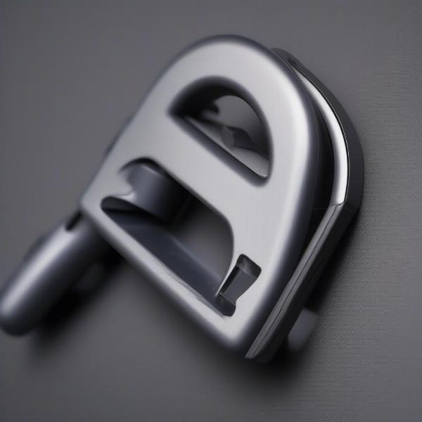 Close-up of a dual retractable lead handle and locking mechanism